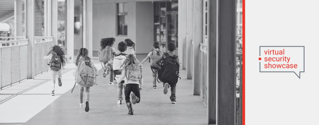 Children running in a school hallway