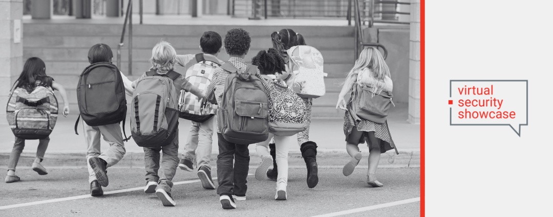 Young Children Walking to the School Entrance